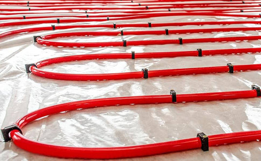 PEX pipe hydronic radiant floor layout on a plywood floor